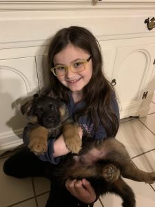 Lauren White Holding Puppy